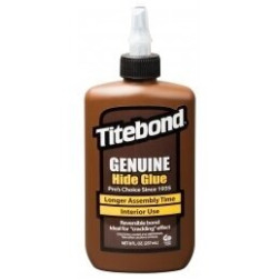 Medienos klijai “Titebond Genuine Hide Glue”. Ypač stiprūs klijai antikvariniams baldams ir muzikos instrumentams